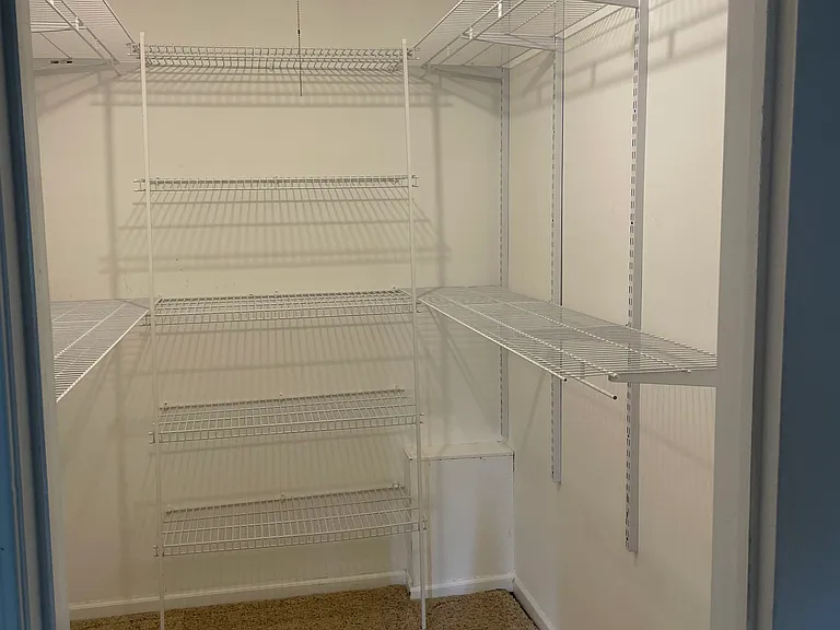 Large walk in closet in master bedroom