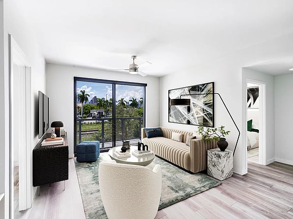Stylish living spaces at Modera Aventura blend sleek design with views of Miami''s tropical landscape.