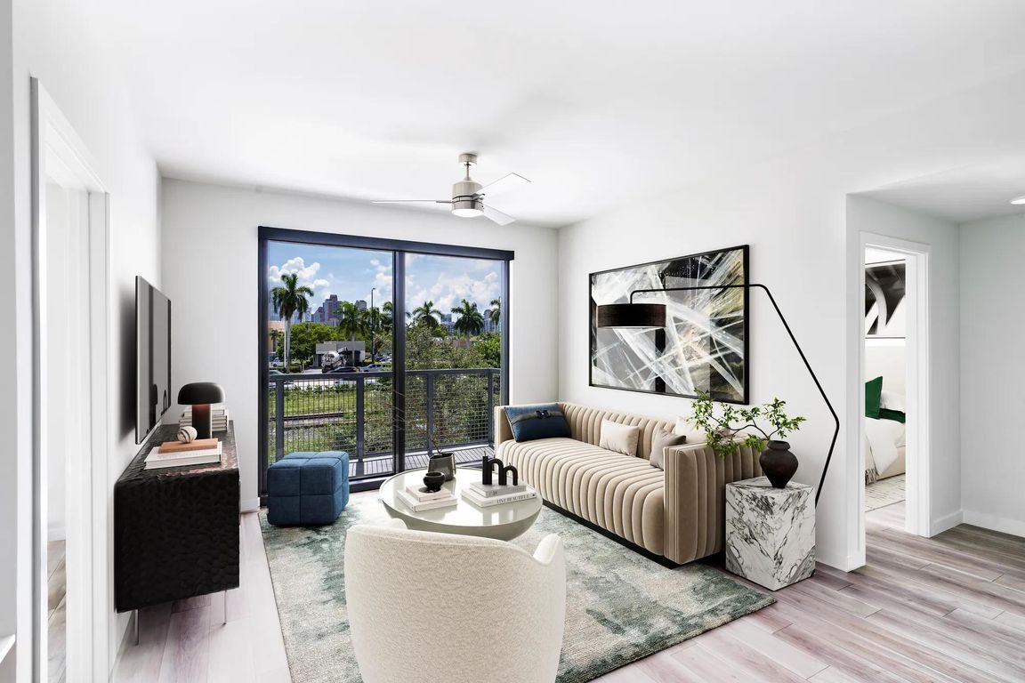 Stylish living spaces at Modera Aventura blend sleek design with views of Miami's tropical landscape.