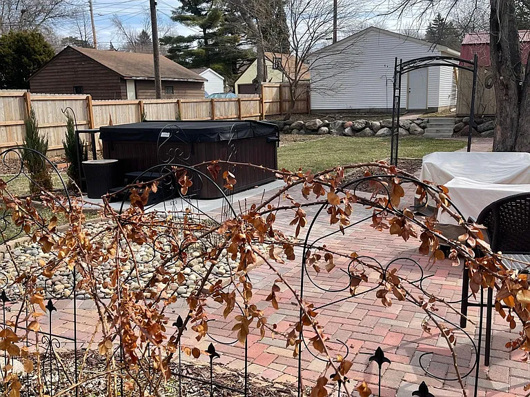 Backyard with view of the garage