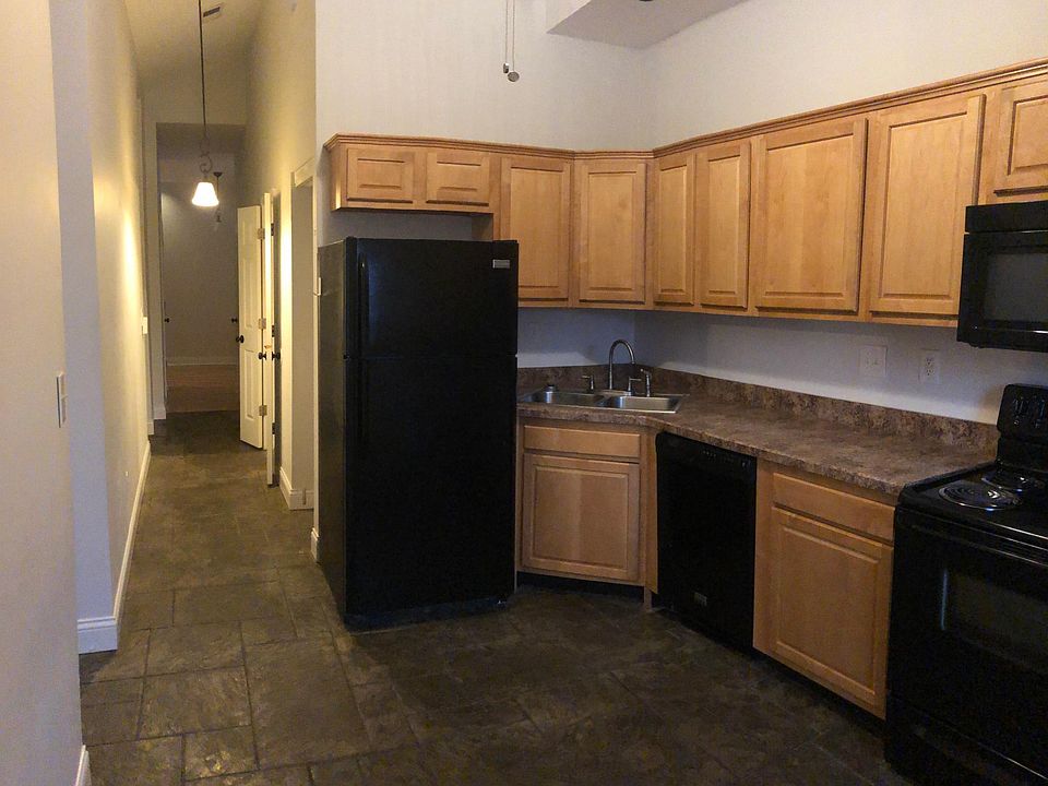 Kitchen (living room to left). There are two hallway closets. The laundry is also off the hallway (directly behind the fridge). Laundry is for a stack washer and dryer.