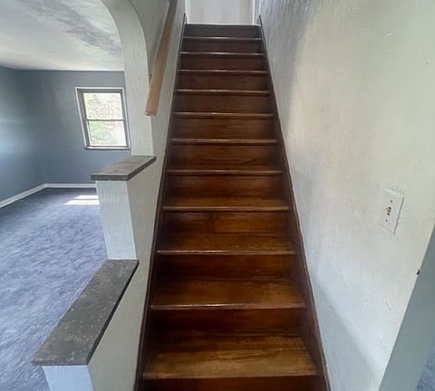 Steps leading to the 3 bedrooms