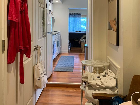 Entry hall w/ walk-in closet on R, double closets on L.