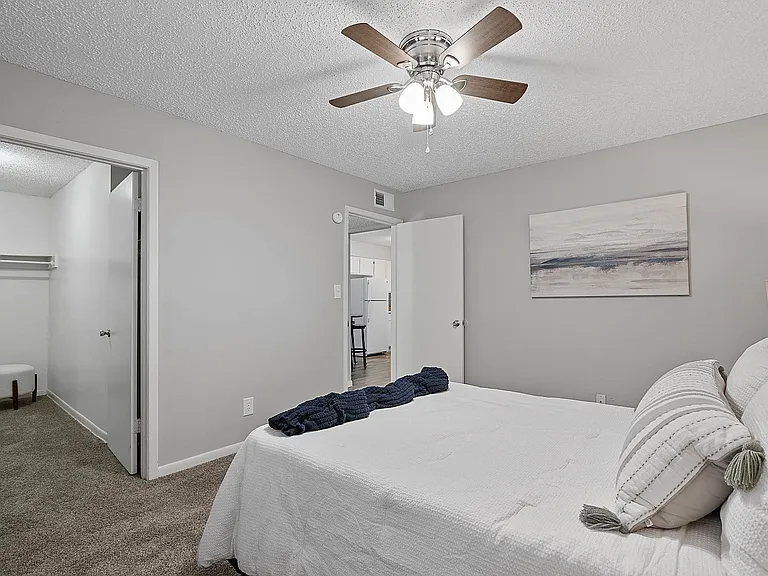 Relax in your inviting bedroom with ample storage and soft natural lighting.
