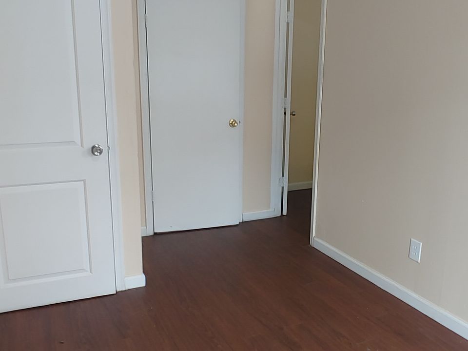 small space across from kitchen, can have a small table with two chairs near right wall