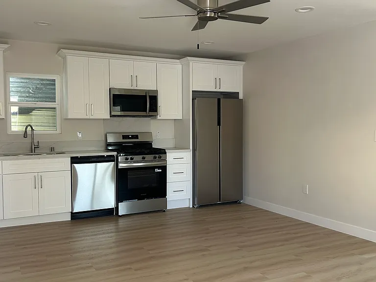 Large open kitchen - ALL NEW Appliances, floors , fixtures etc.