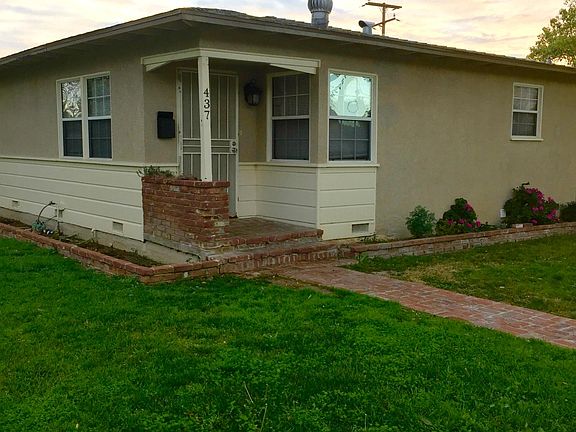 Front door faces Jacaranda