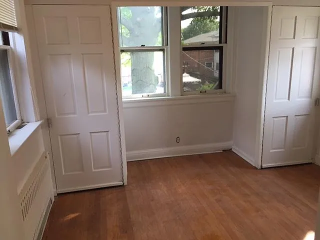 sunroom with heat source and extra closets