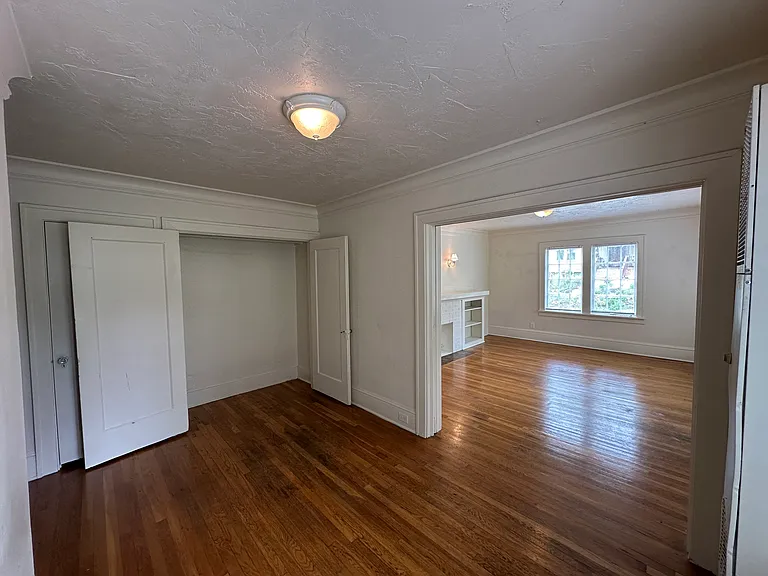 dining room looking into living room, views of 1 of many closets