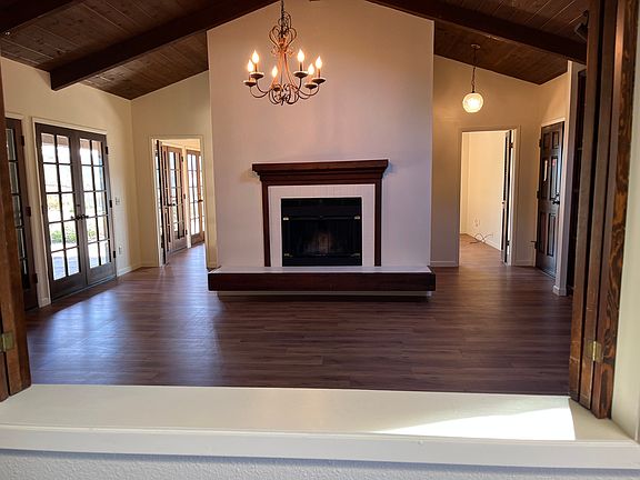 Dining room from kitchen; fireplace
