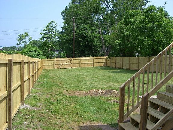Huge back yard w/privacy fence and front/rear gates. Room to add detached gar.