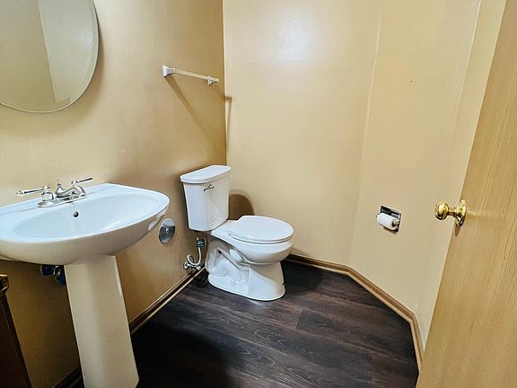 Powder Room (new LVP flooring, new toilet unit)