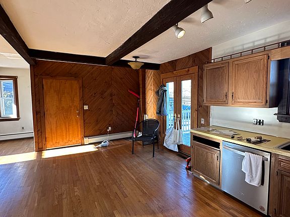 View from the hallway where you have an extra pantry closet and coat closet.