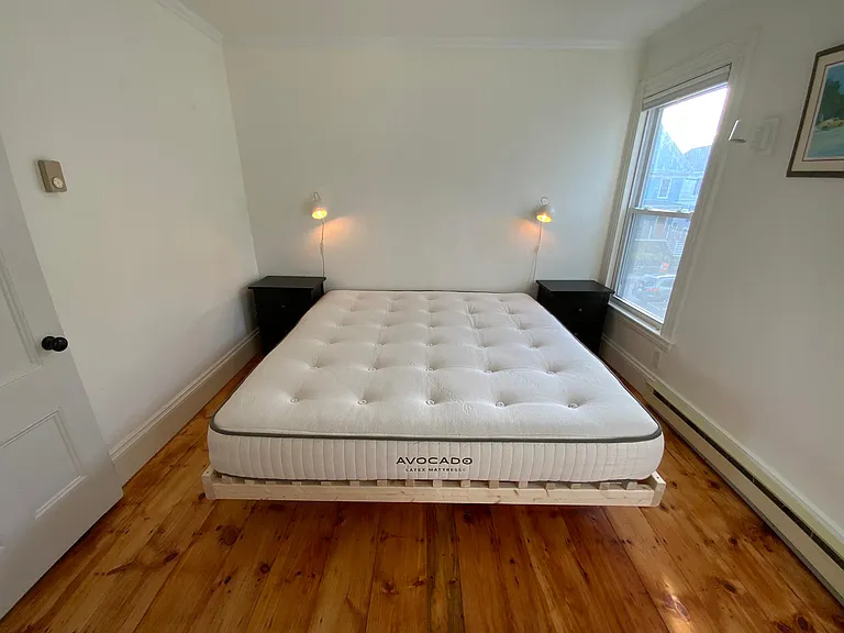 Primary bedroom with organic king mattress by Avocado.