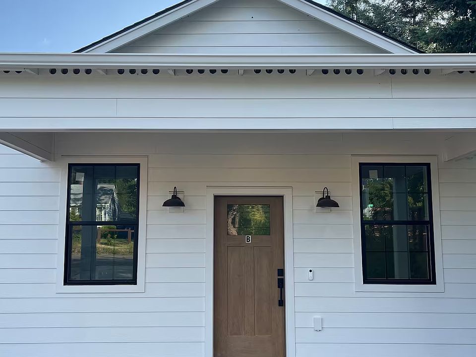 Front entry with keypad and trex porch.
