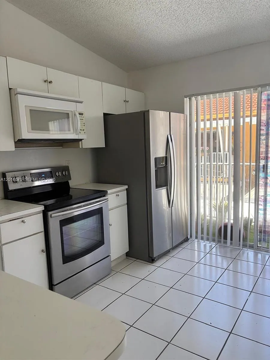 Building Photo - 7778 W 34th Ln #20201