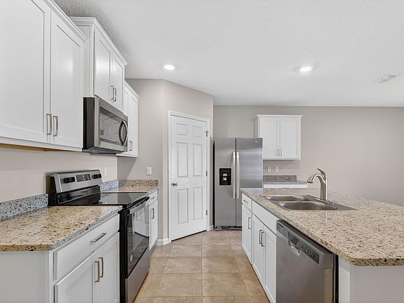 3rd image of 6556 NW Oaklawn Way