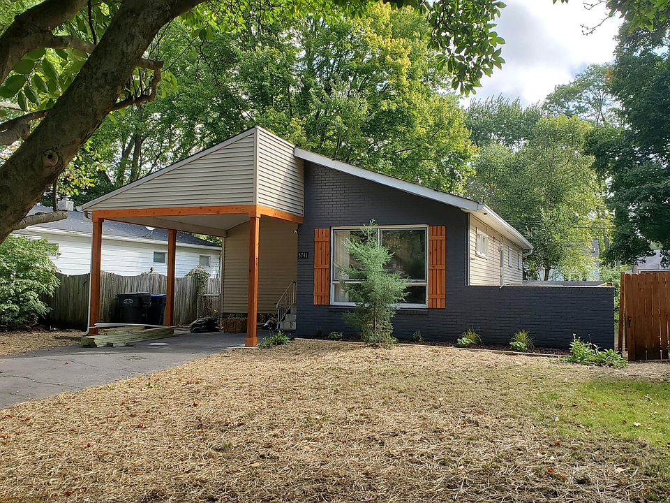 Mid-century house with cedar accents and new landscaping