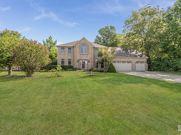 Set back on a wooded lot at the end of a quiet cul-de-sac