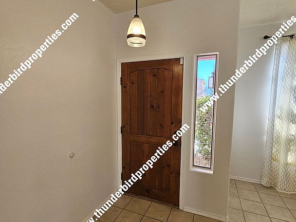 2nd image of 10519 Rosefinch Dr NW