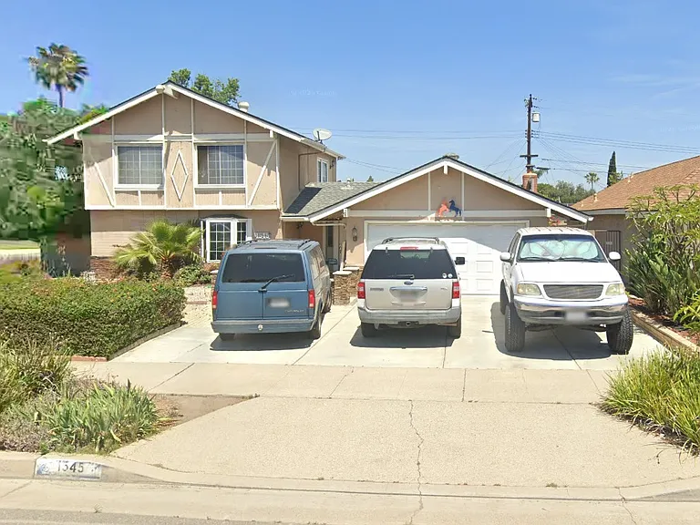 3 parking spaces on the driveway, pls 2 car garage