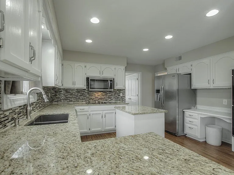 Laundry and pantry right behind the kitchen.
