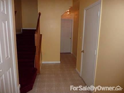 Foyer
						:
						Foyer has Closet on Left sIde. Has Garage Door on Right. Utility under Stair
