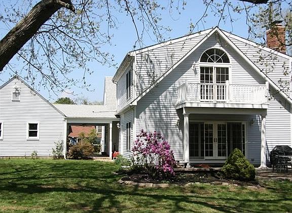 Rear view of home and garage.