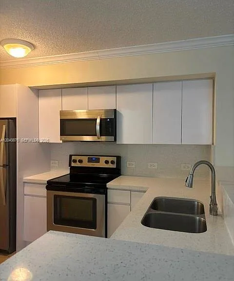 11155 SW 5th Pl #205 — Photo 1