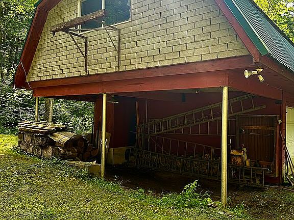 View from back with carport.