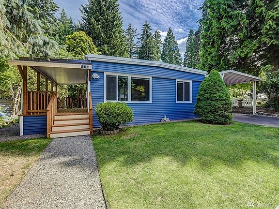 Holly Hills, you own the land! Brand new siding and deck. Front door entrance from deck. 