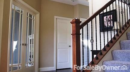 View from the Front Door Entry Way
						:
						Office & powder room to the left, up stairs straight ahead, formal dining right.
