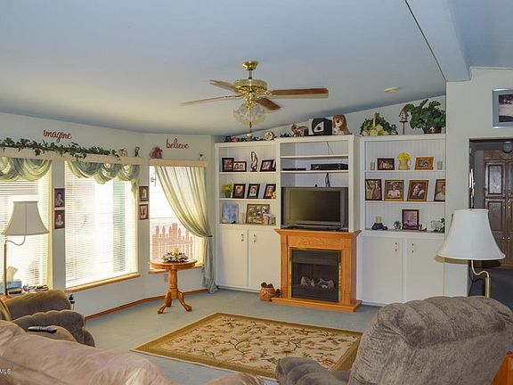 Bright Open Living Room with Fireplace