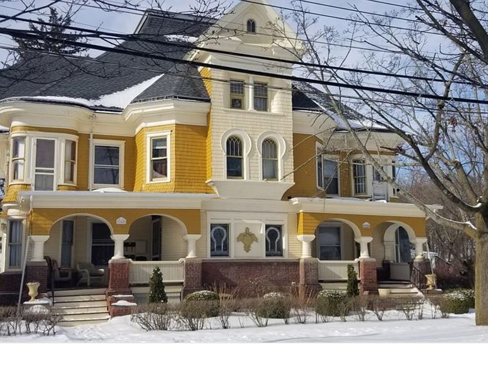 Apartment is second floor left side. Rounded alcove and large windows with southern exposure provide plenty of light.