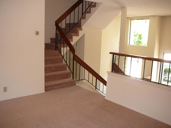 Staircase to upper floor with bedrooms