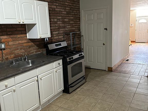 View from rear of kitchen to front door