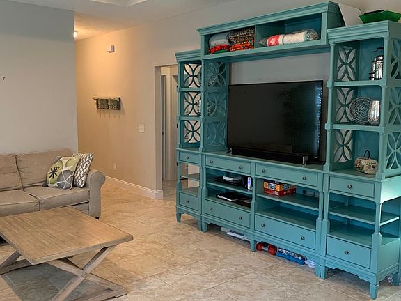 55" Smart TV, DVD player, sound bar with subwoofer, Nintendo Wii and games included.