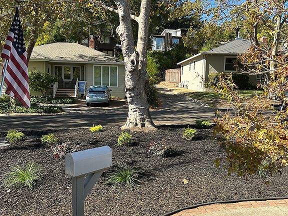 View to front yard and street from front porch