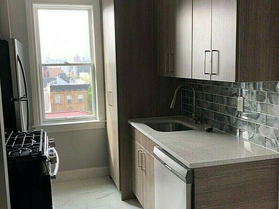 5th image of 3112 38th Ave APT 6H