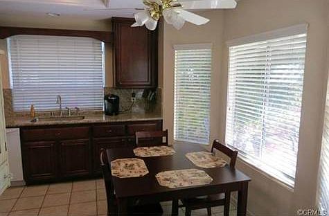 Breakfast nook adjacent to family room with wonderful view of ba