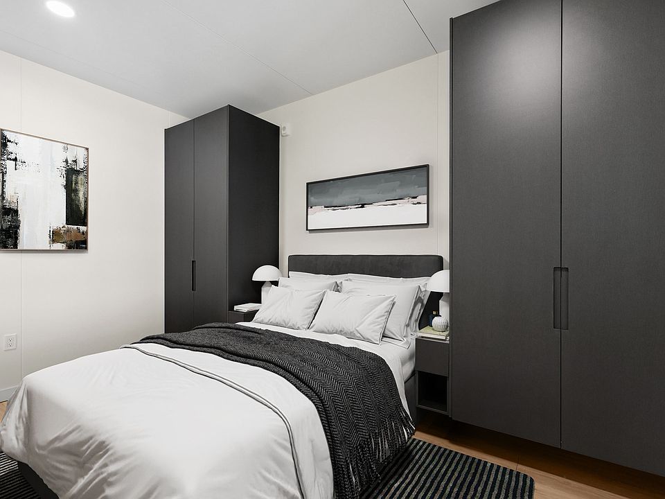 Unwind in a peaceful bedroom retreat filled with natural light.