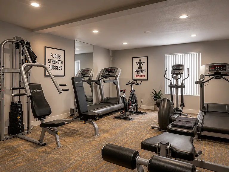 Modern home gym with motivational decor