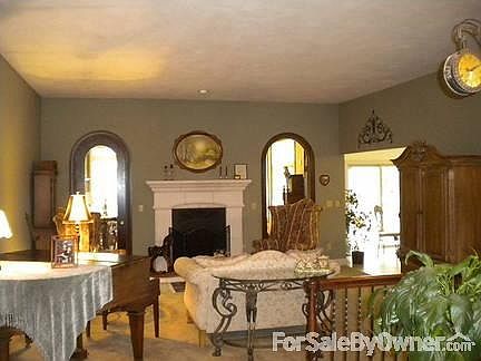 Formal Living Room
						:
						This is a view of the formal living room from the foyer.