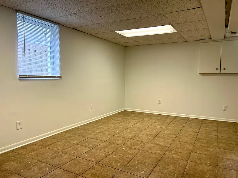 Basement bedroom with egress window
