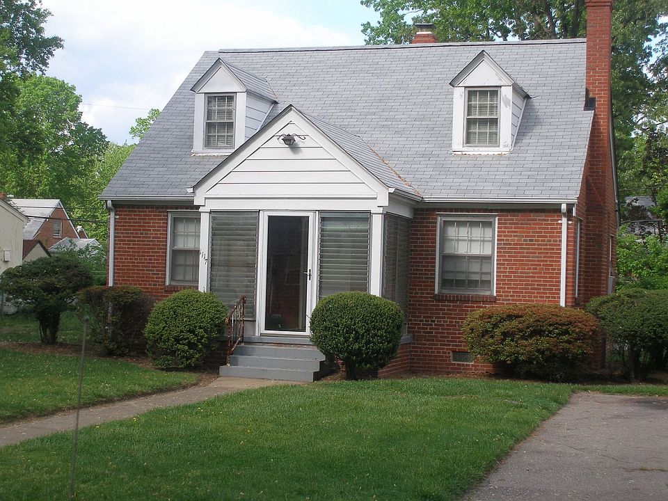    Manicured Yard & Paved Driveway
