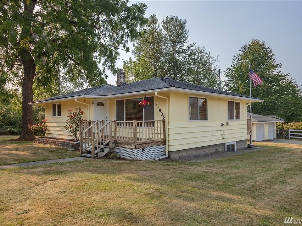 A view of the front of the home, nicely set back from the street.