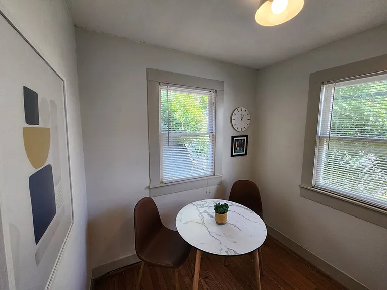 E 11th 1/2 St — Photo 10