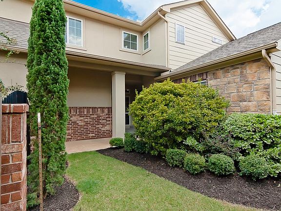 More landscaping and yard space just off the front porch area.