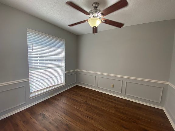 Dining room with new manufactured hardwoods, can be flex space for office.