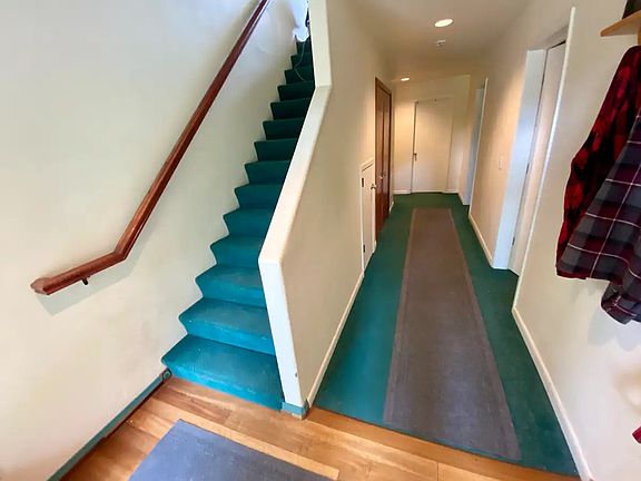 Hall & stairs leading to the main house